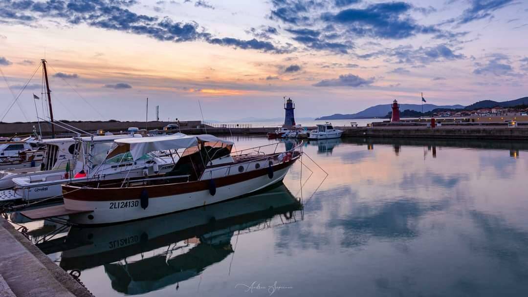 porto Castiglione della Pescaia barche faro foto Andrea Sapienza